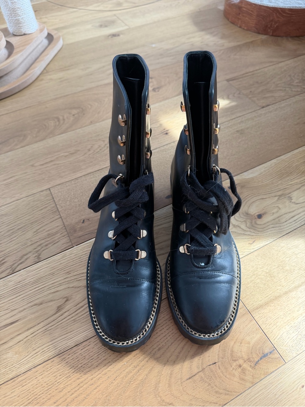 Stuart Weitzman Kolbie Black Lace-Up Leather Combat Boots with Gold Eyelets